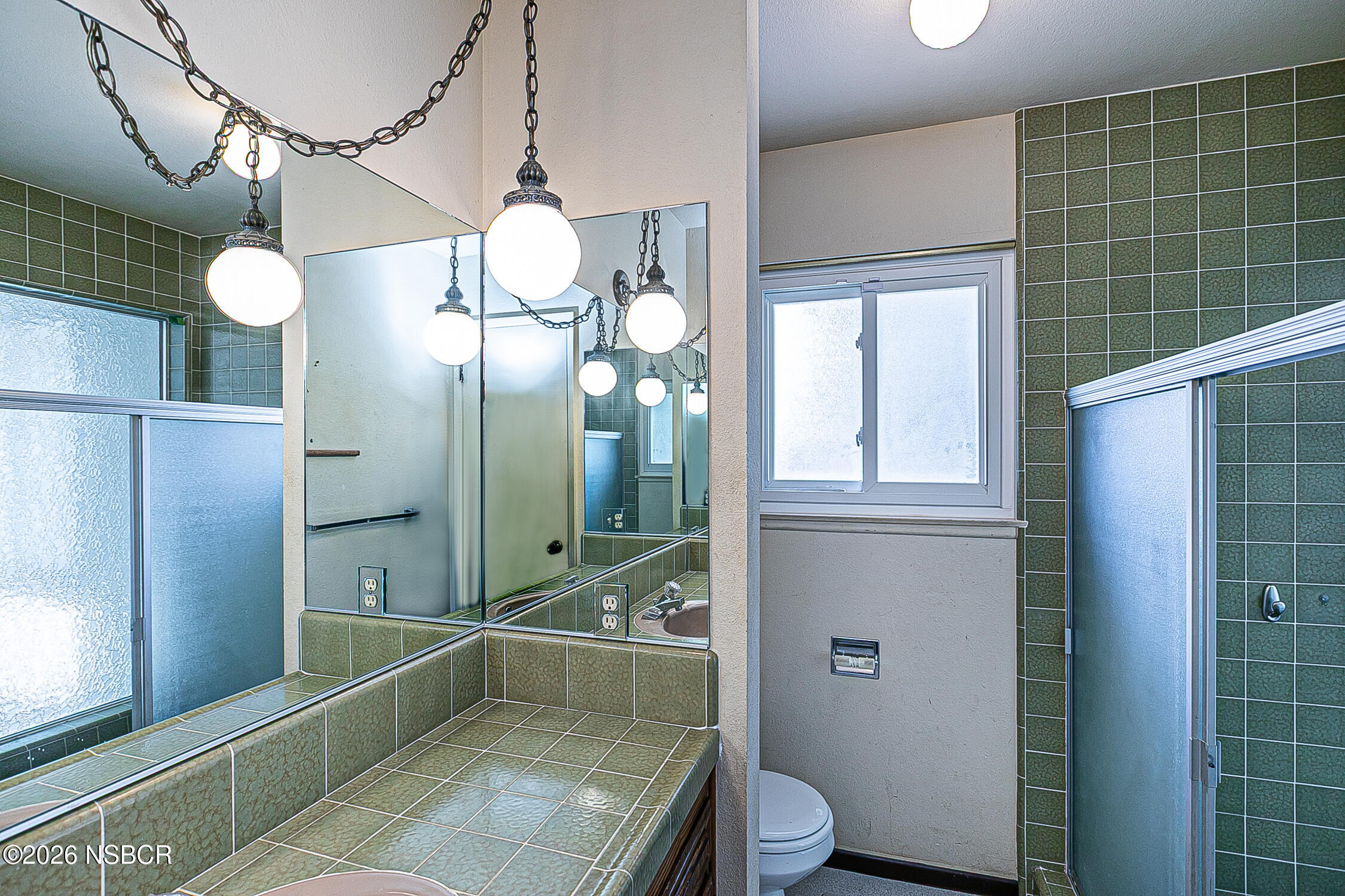 1260 Onstott Road Lompoc, CA 93436 - Photo 31 of 52 a bathroom with a sink a toilet and shower