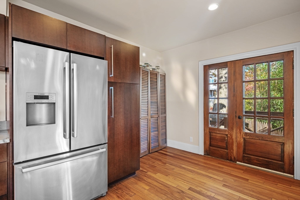 21 Bay View Drive Swampscott, MA 01907 - Photo 21 of 42 a kitchen with stainless steel appliances granite countertop a refrigerator and a sink