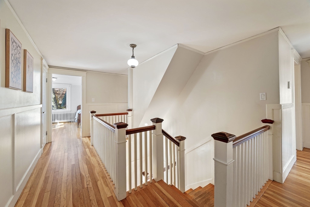 21 Bay View Drive Swampscott, MA 01907 - Photo 23 of 42 a view of a hallway with wooden floor and staircase