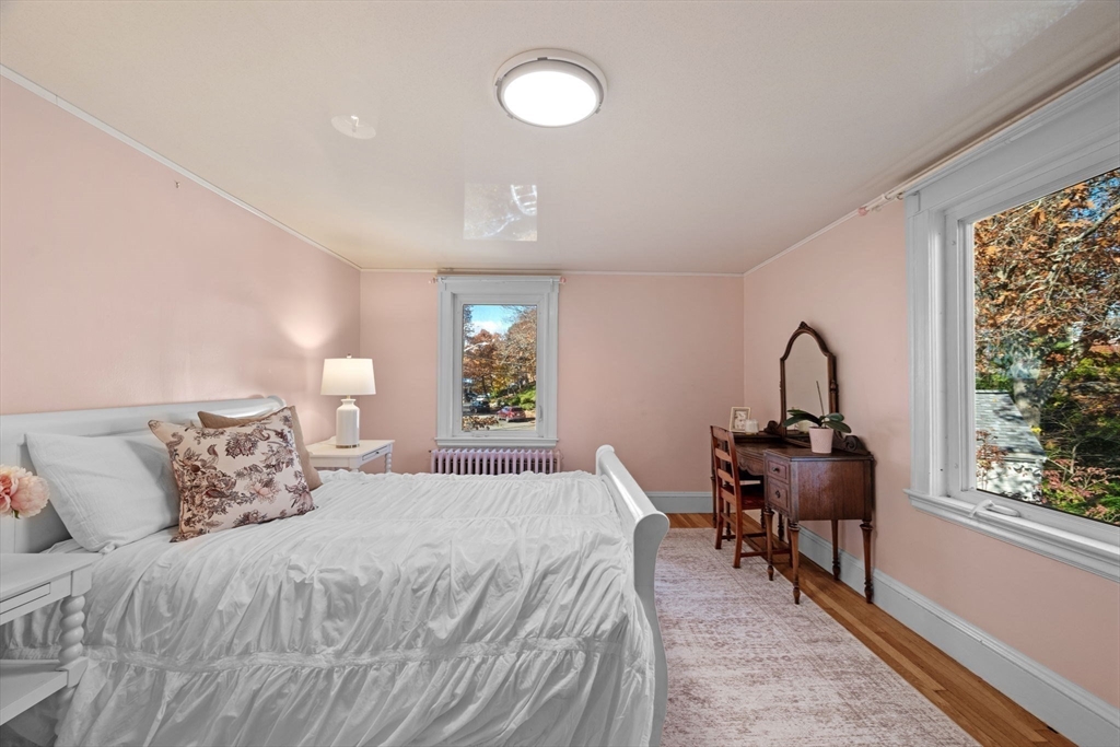 21 Bay View Drive Swampscott, MA 01907 - Photo 35 of 42 a bedroom with a bed and a window