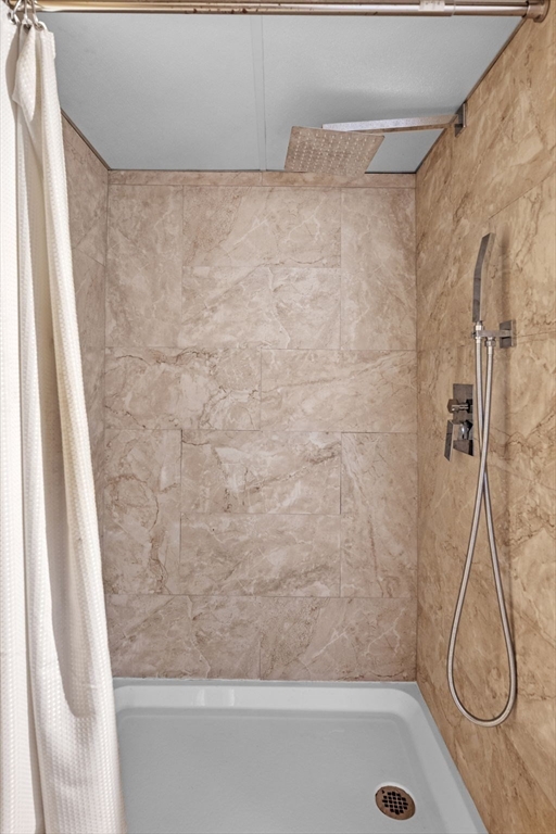 21 Bay View Drive Swampscott, MA 01907 - Photo 39 of 42 a bathroom with a shower