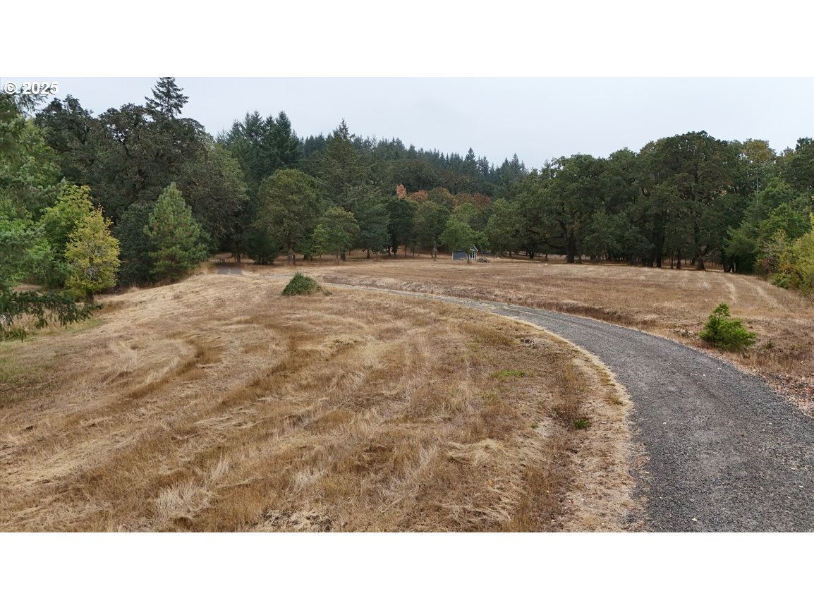 Northwest Baker Creek Road McMinnville, OR 97128 - Photo 6 of 7 a black and white photo of a field