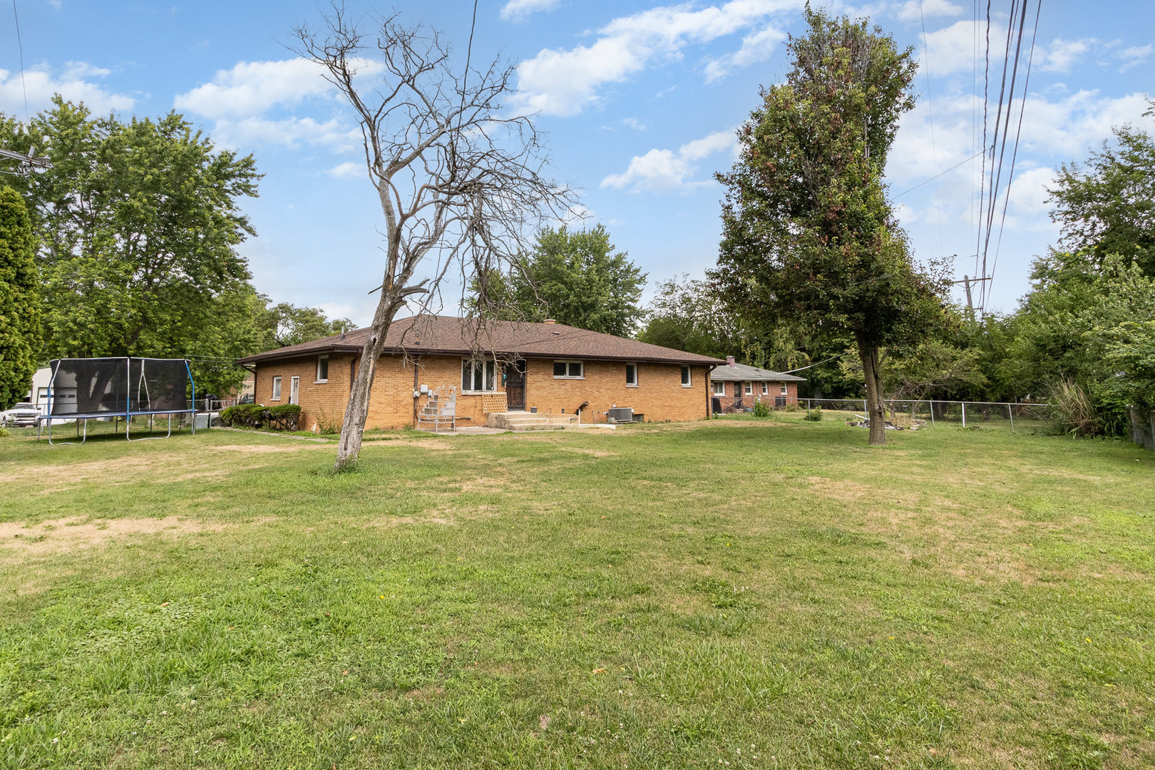 636 Patterson Road Joliet, IL 60436 - Photo 16 of 16 a front view of a house with a garden