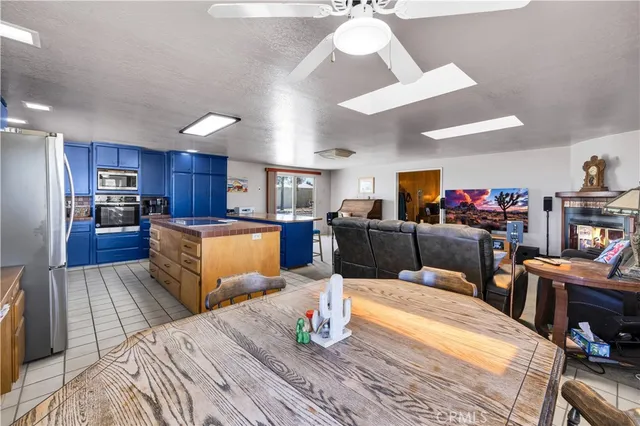 a spacious bedroom with a bed and a window