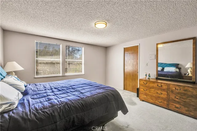 a room with furniture and a large window