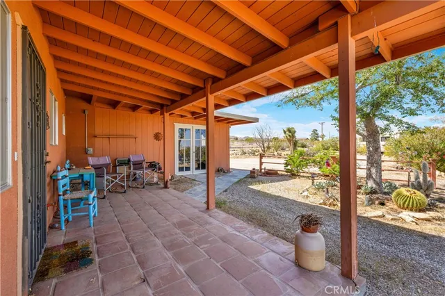 a room with furniture and pool table