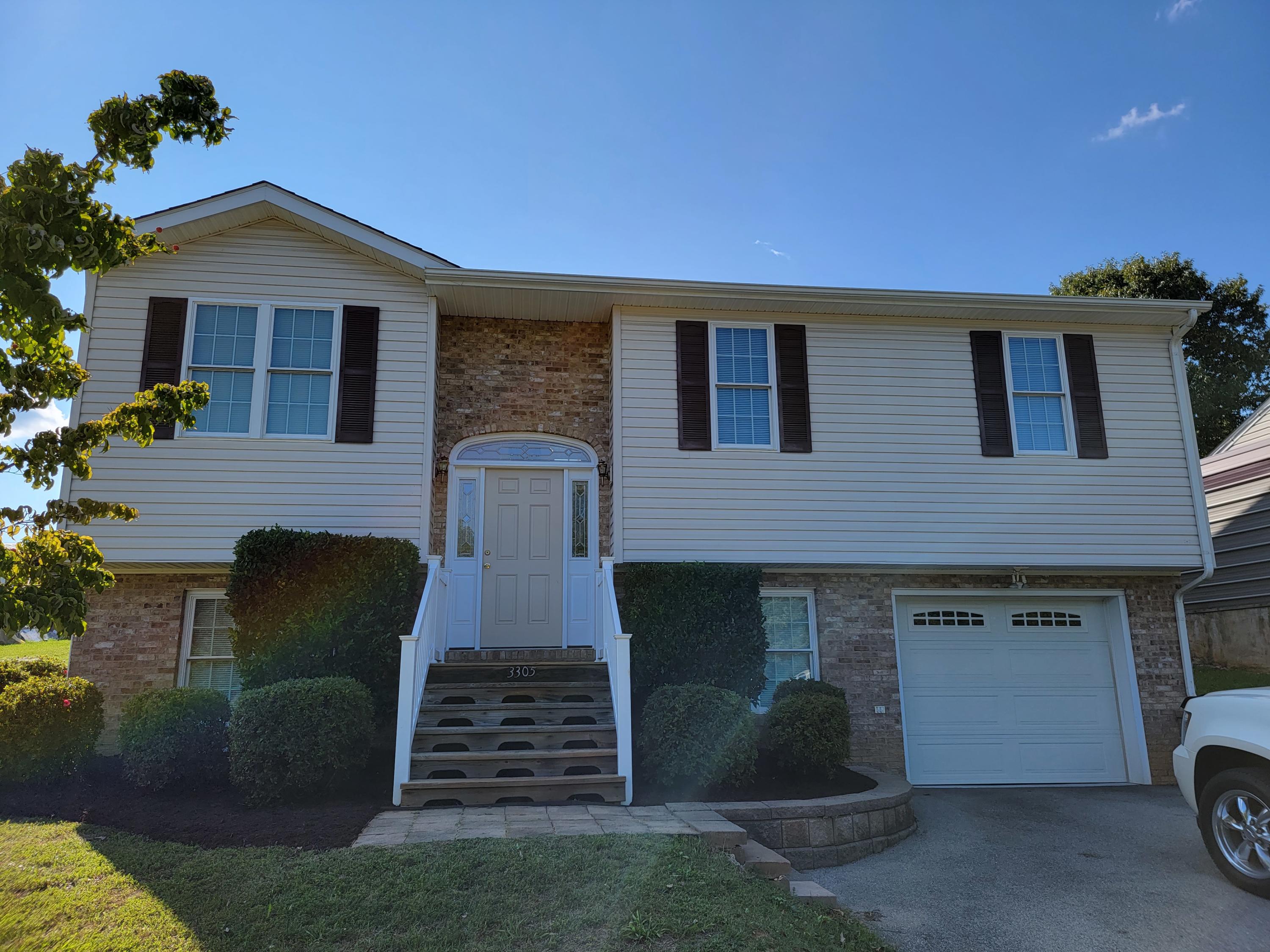 3305 Troxell Road Southeast Roanoke, VA 24014 - Photo 2 of 14 a front view of a house with a yard