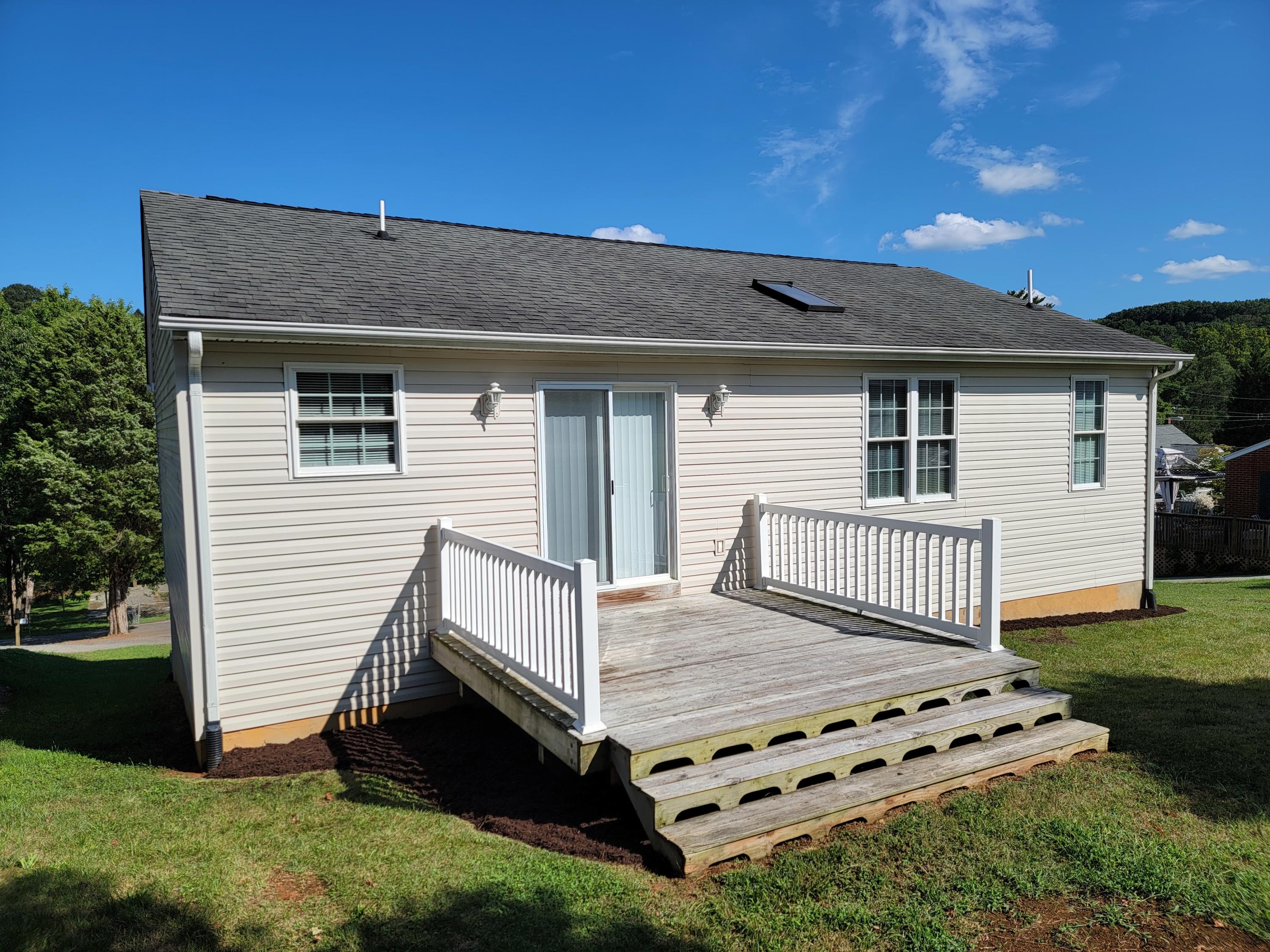 3305 Troxell Road Southeast Roanoke, VA 24014 - Photo 13 of 14 a front view of a house with garden