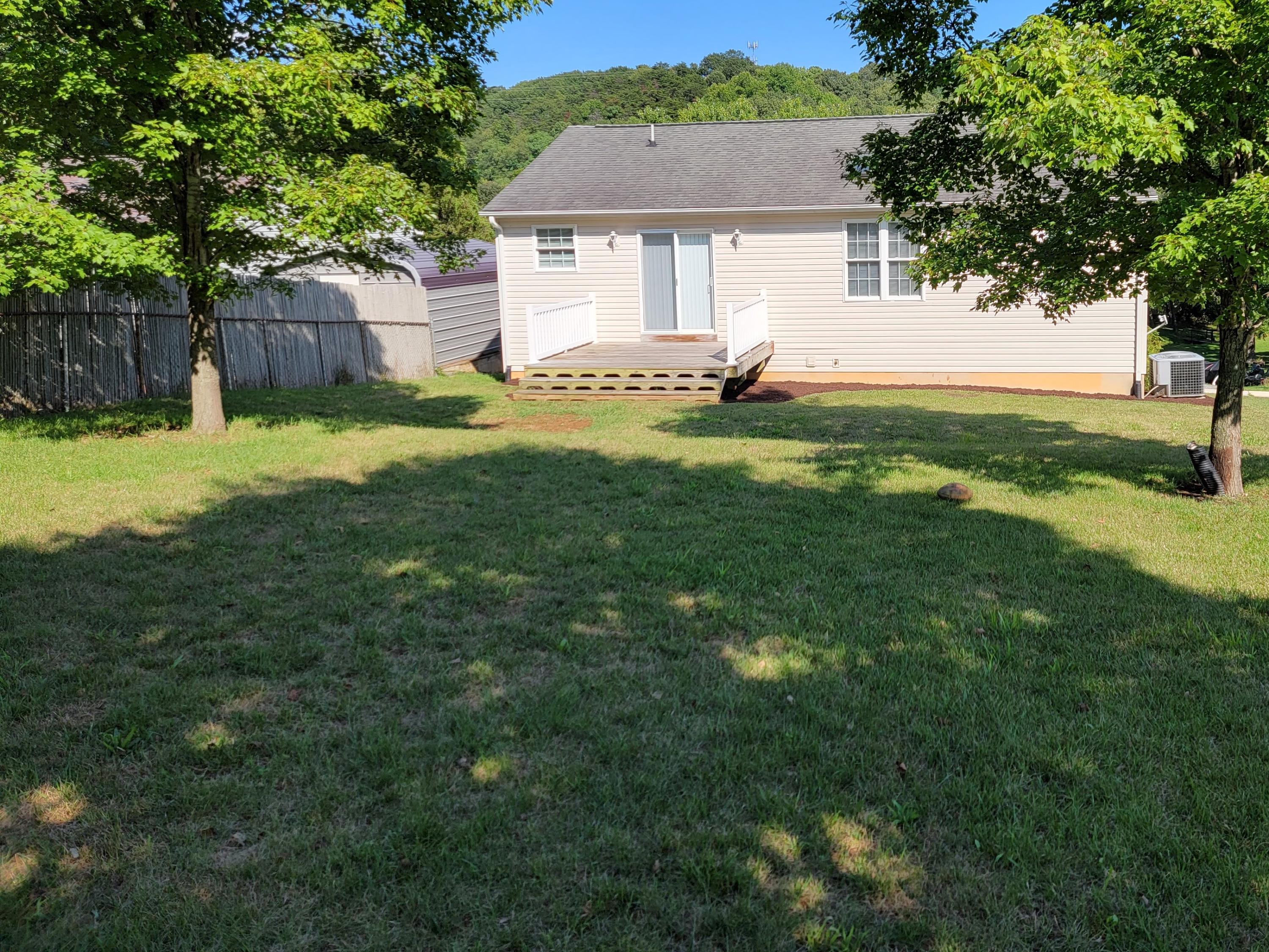 3305 Troxell Road Southeast Roanoke, VA 24014 - Photo 14 of 14 a front view of a house with yard and green space