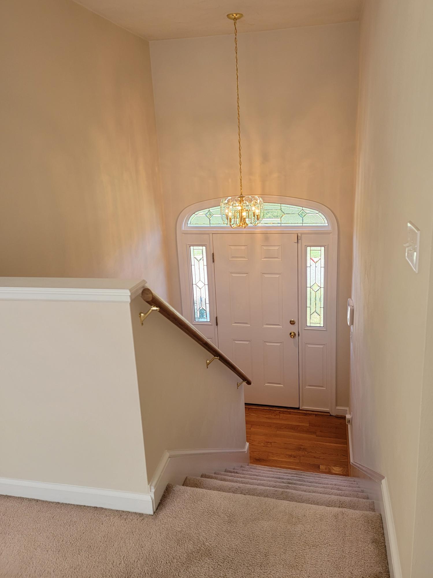 3305 Troxell Road Southeast Roanoke, VA 24014 - Photo 7 of 14 a view of a hallway with a chandelier