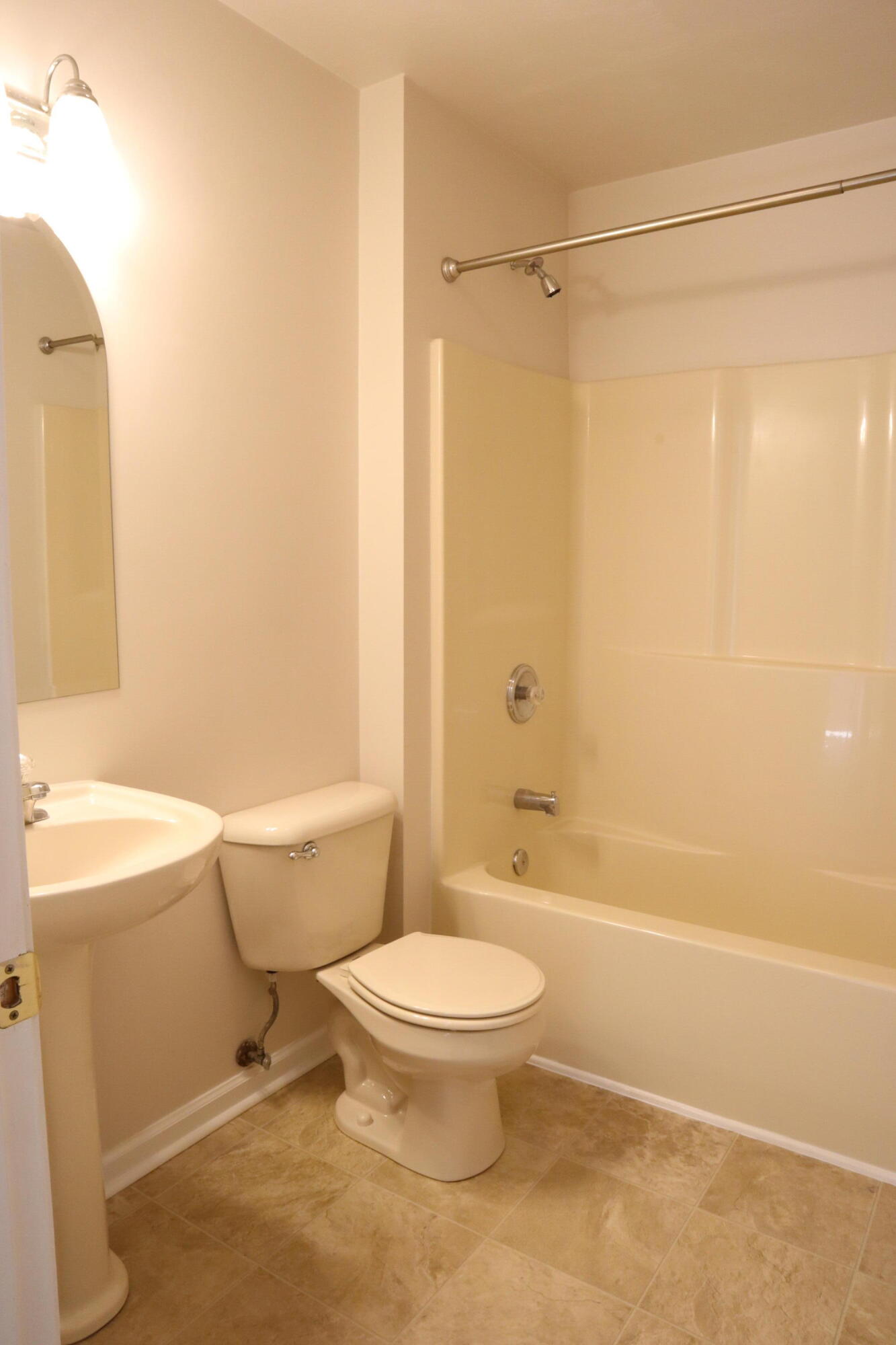 3305 Troxell Road Southeast Roanoke, VA 24014 - Photo 9 of 14 a bathroom with a toilet a sink and a bathtub