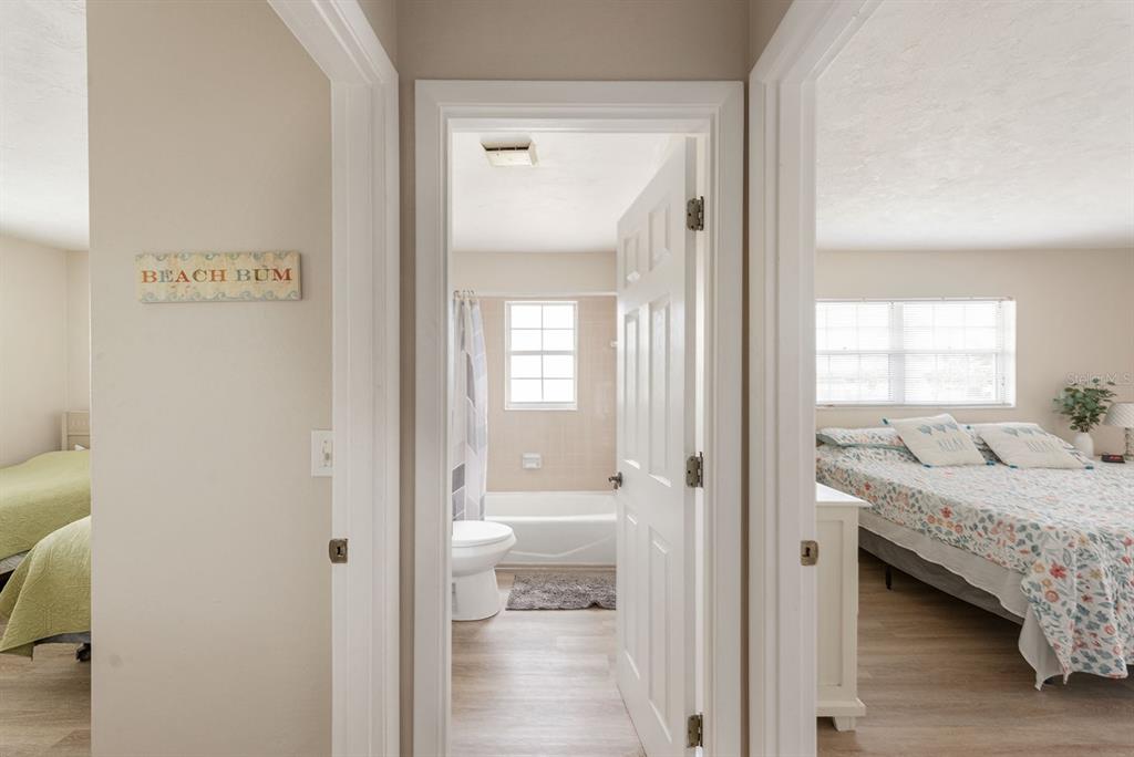 1531 Placida Road, Unit 1204 Englewood, FL 34223 - Photo 23 of 58 a bathroom with a granite countertop sink and a window