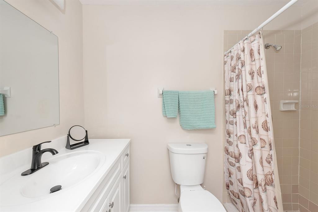 1531 Placida Road, Unit 1204 Englewood, FL 34223 - Photo 28 of 58 a bathroom with a sink and a toilet
