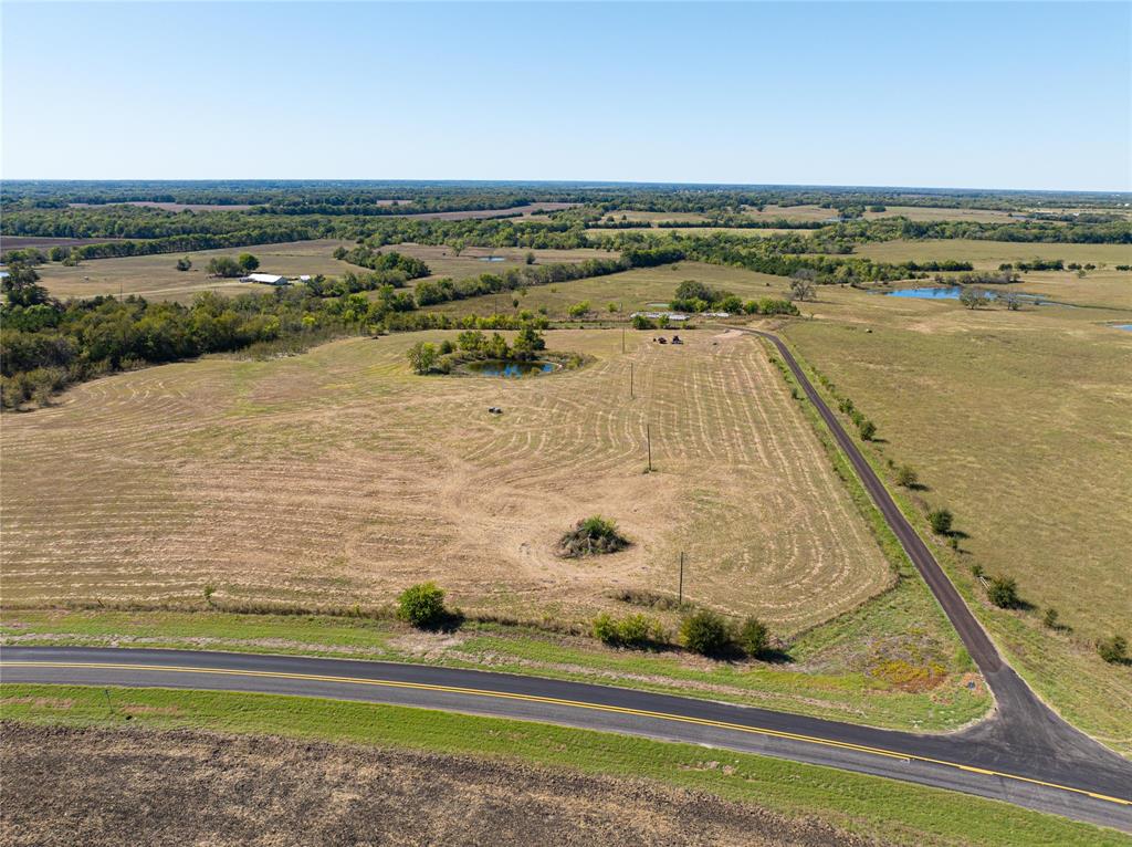 1 Fm 2675 Roxton, TX 75477 - Photo 2 of 12 a view of a swimming pool and an ocean view