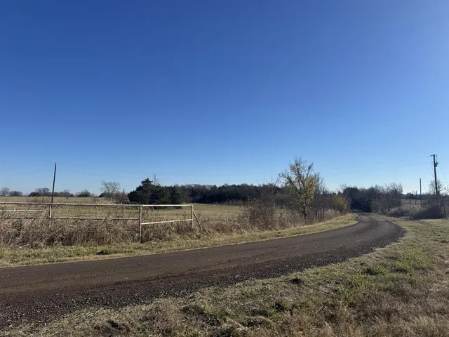 a view of lake with mountain in background