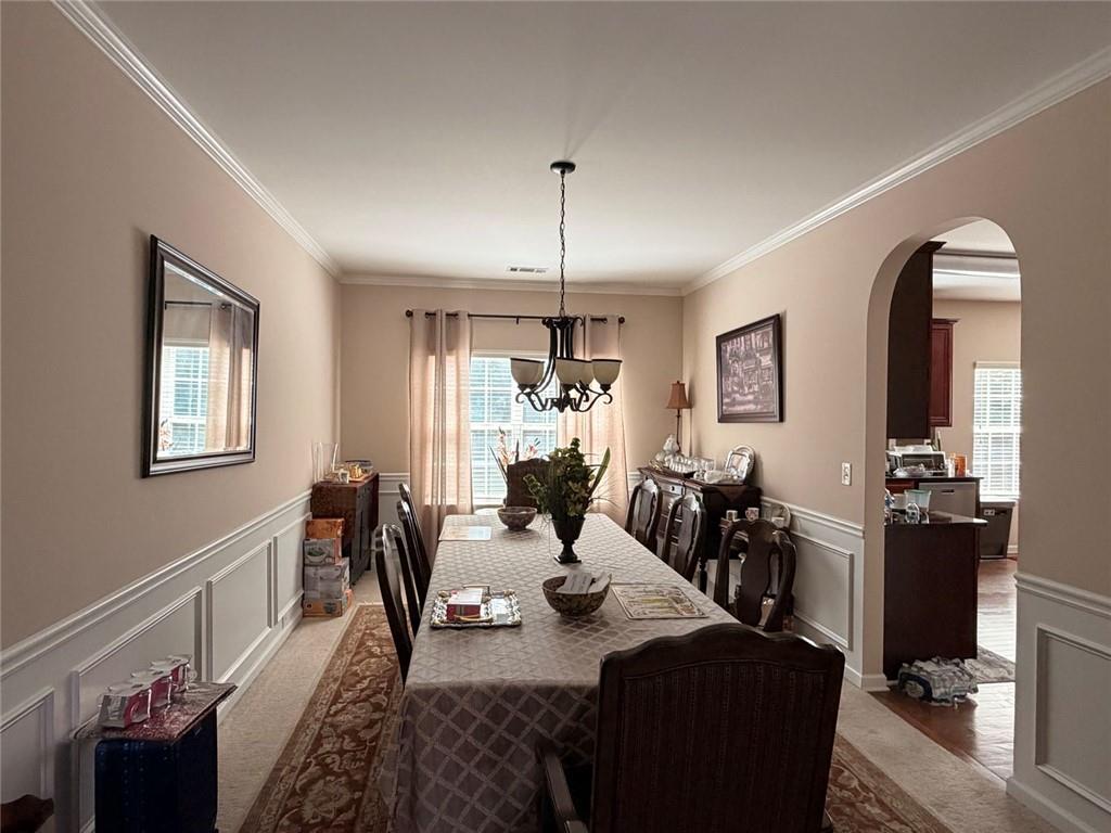 4080 Kittery Point Southwest Snellville, GA 30039 - Photo 19 of 25 a living room with furniture and wooden floor