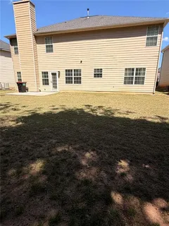 a view of house with ocean view