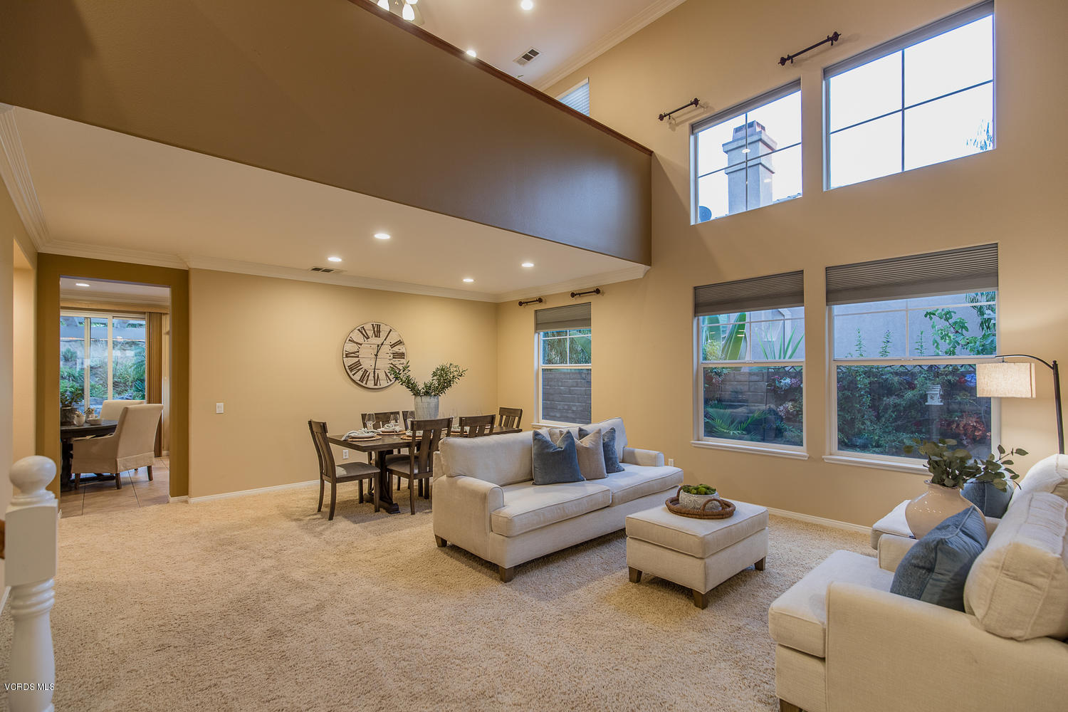 14410 Peach Hill Road Moorpark, CA 93021 - Photo 11 of 45 a living room with furniture and large windows
