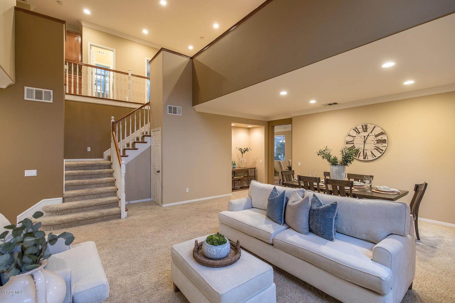14410 Peach Hill Road Moorpark, CA 93021 - Photo 12 of 45 a living room with furniture and a chandelier