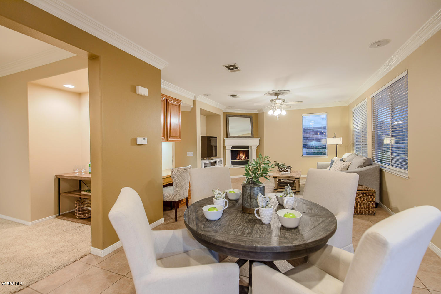 14410 Peach Hill Road Moorpark, CA 93021 - Photo 15 of 45 a view of a dining room with furniture and wooden floor