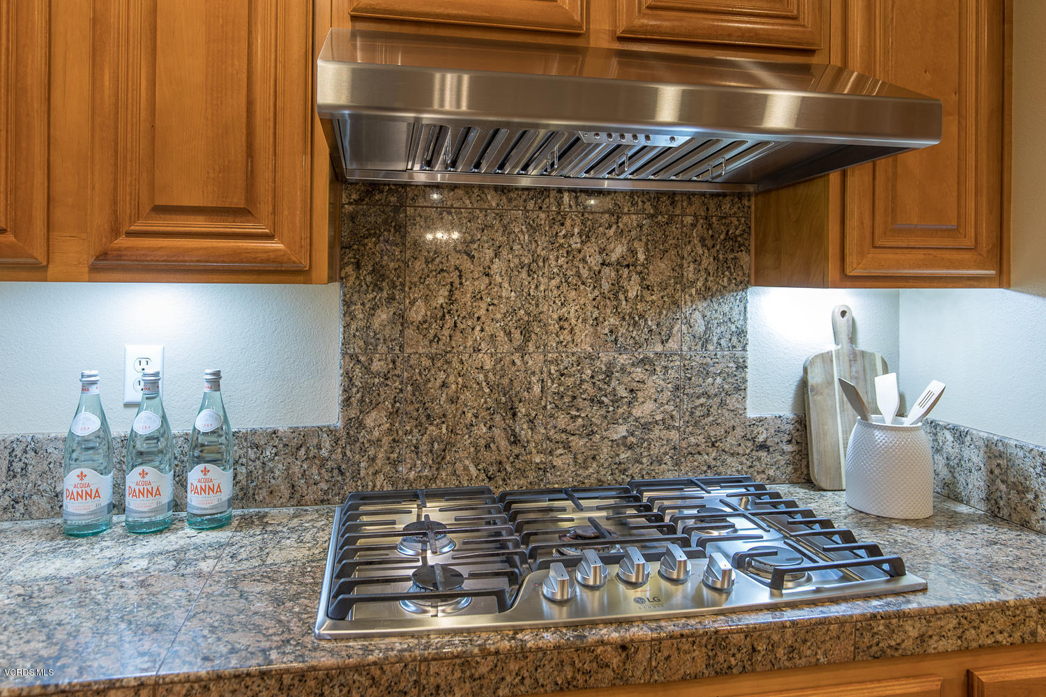 14410 Peach Hill Road Moorpark, CA 93021 - Photo 22 of 45 a kitchen with a stove and cabinets