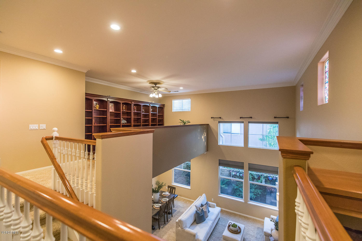14410 Peach Hill Road Moorpark, CA 93021 - Photo 30 of 45 a view of a kitchen with furniture and a book shelf