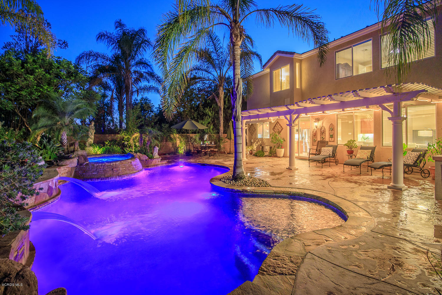 14410 Peach Hill Road Moorpark, CA 93021 - Photo 45 of 45 a view of a swimming pool with an outdoor space and seating area