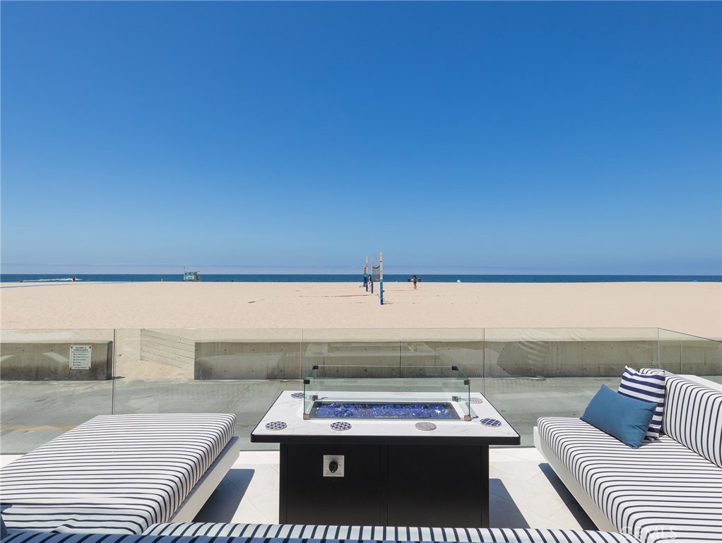 230 The Strand Hermosa Beach, CA 90254 - Photo 11 of 72 a close up of a couch in a bed