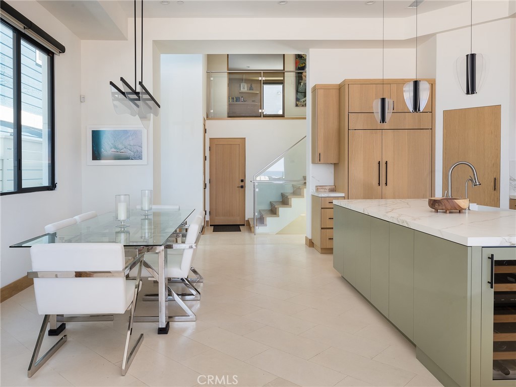 230 The Strand Hermosa Beach, CA 90254 - Photo 21 of 72 a living room with furniture and a table