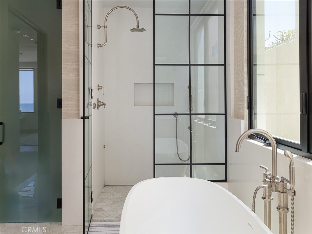 230 The Strand Hermosa Beach, CA 90254 - Photo 33 of 72 a bathroom with a sink and a mirror