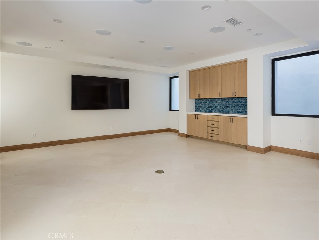 230 The Strand Hermosa Beach, CA 90254 - Photo 52 of 72 a view of an empty room with windows