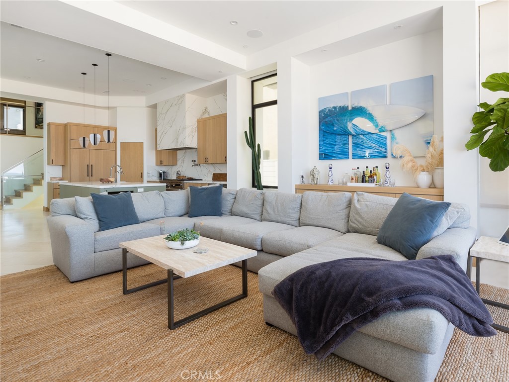 230 The Strand Hermosa Beach, CA 90254 - Photo 9 of 72 a living room with furniture and a large window