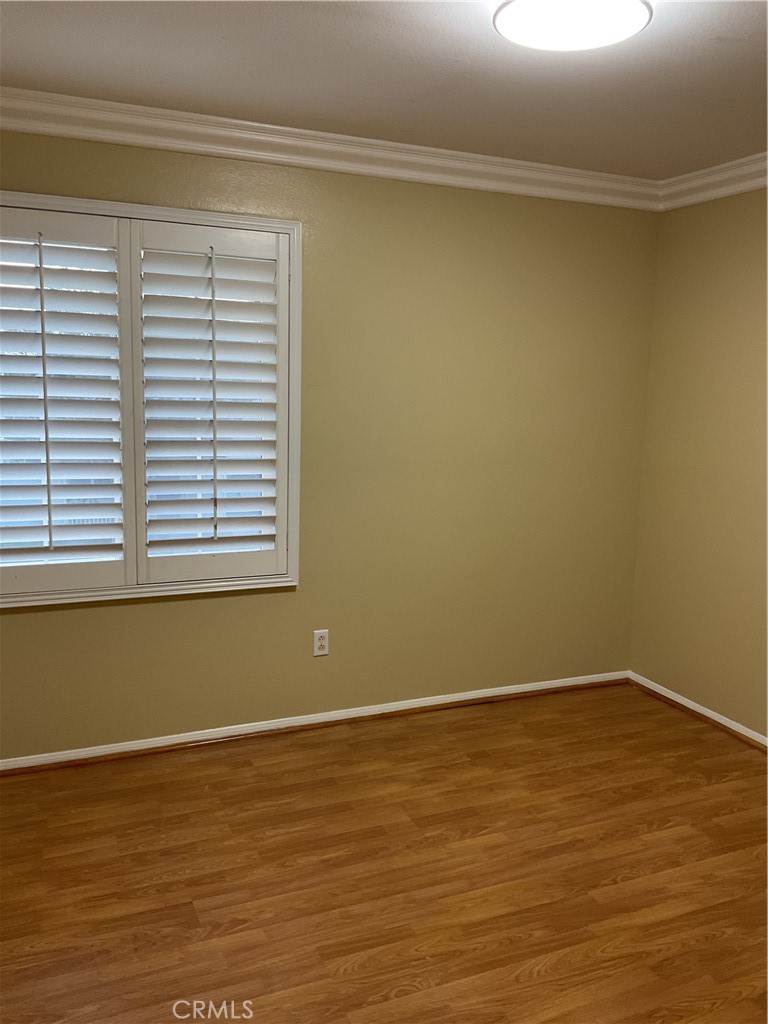17636 Cypress Circle Carson, CA 90746 - Photo 20 of 29 a view of a room with wooden floor and a window