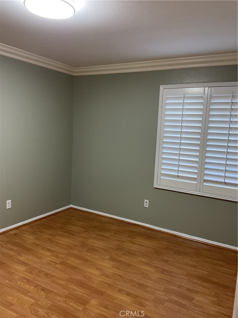 17636 Cypress Circle Carson, CA 90746 - Photo 22 of 29 a view of a room with wooden floor and a window