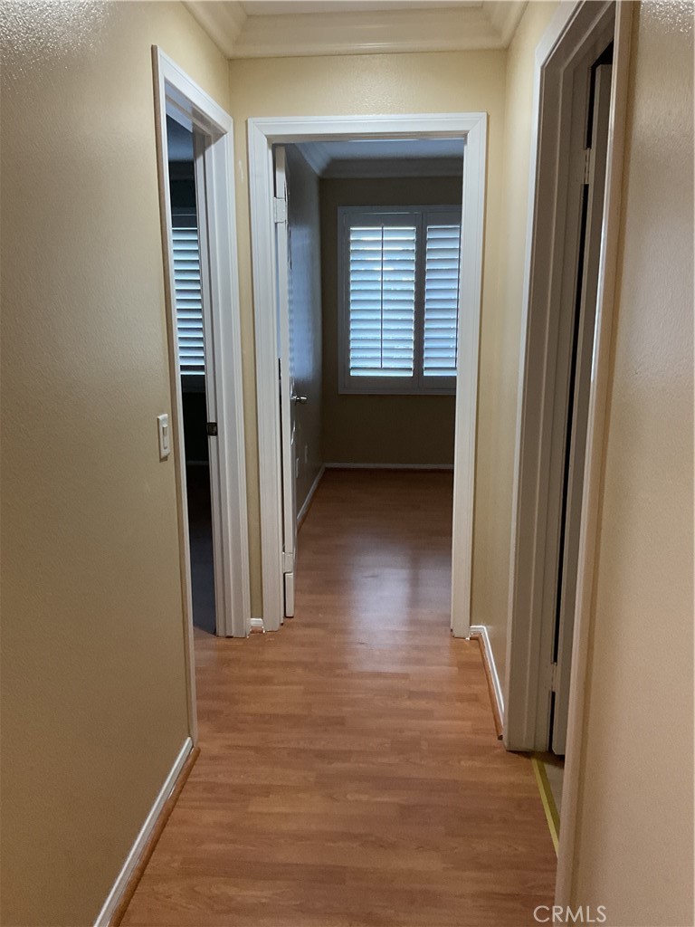 17636 Cypress Circle Carson, CA 90746 - Photo 23 of 29 a view of a hallway with wooden floor and a living room