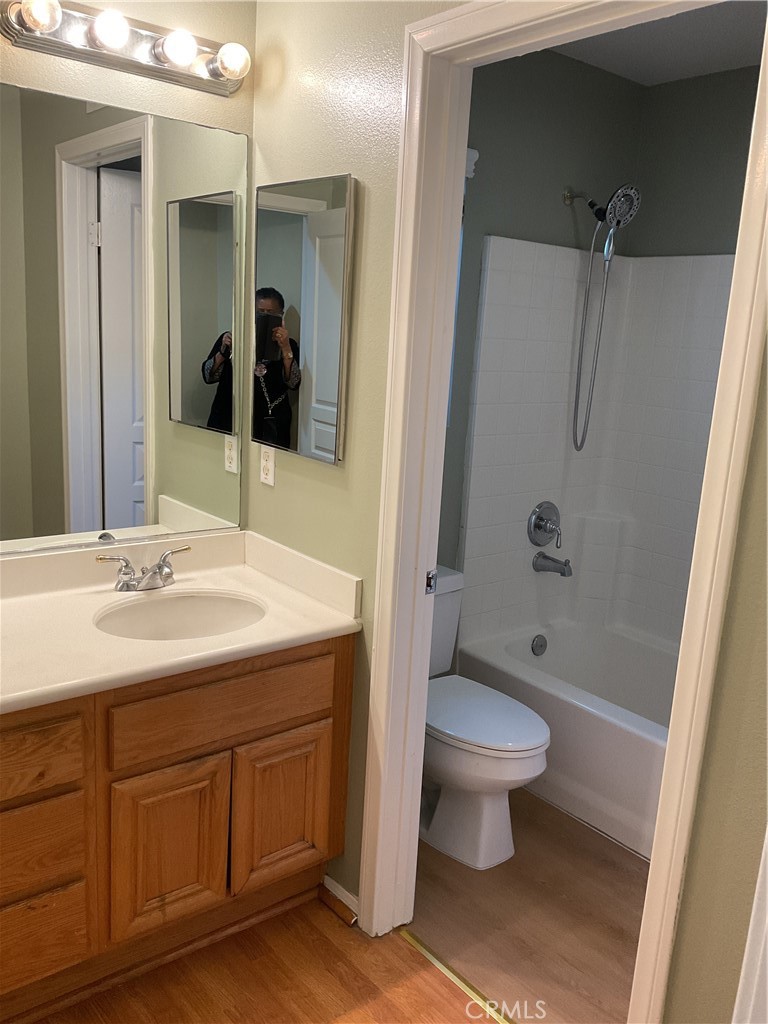 17636 Cypress Circle Carson, CA 90746 - Photo 25 of 29 a bathroom with a sink toilet and shower