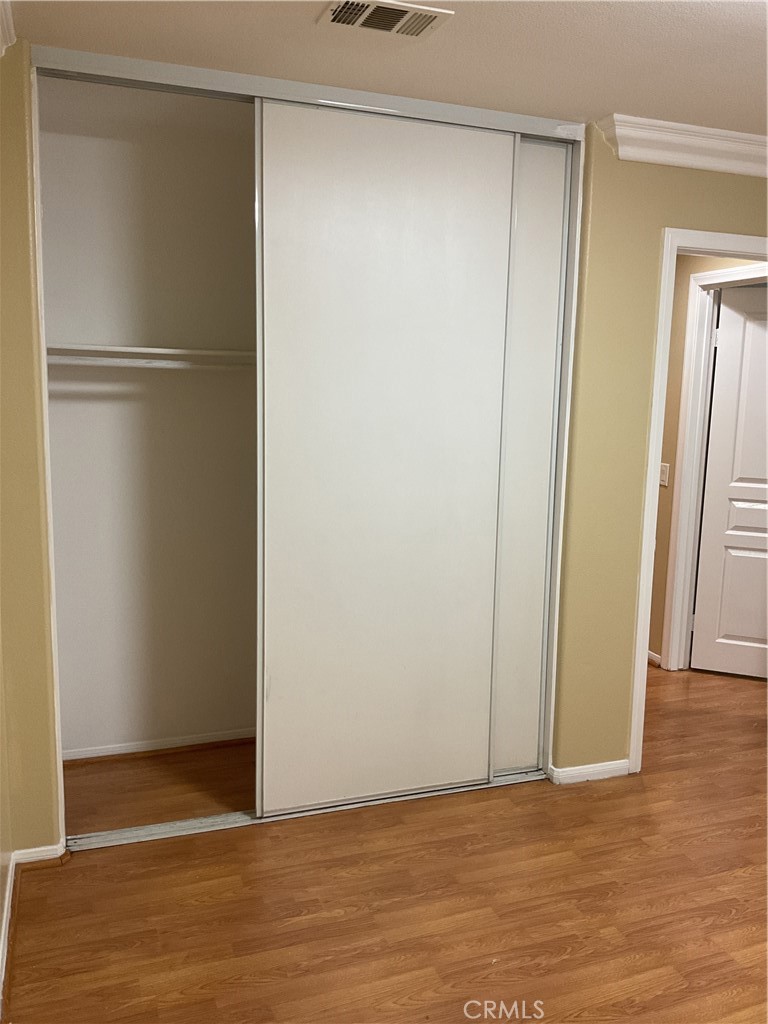 17636 Cypress Circle Carson, CA 90746 - Photo 28 of 29 a view of an empty room with wooden floor and closet
