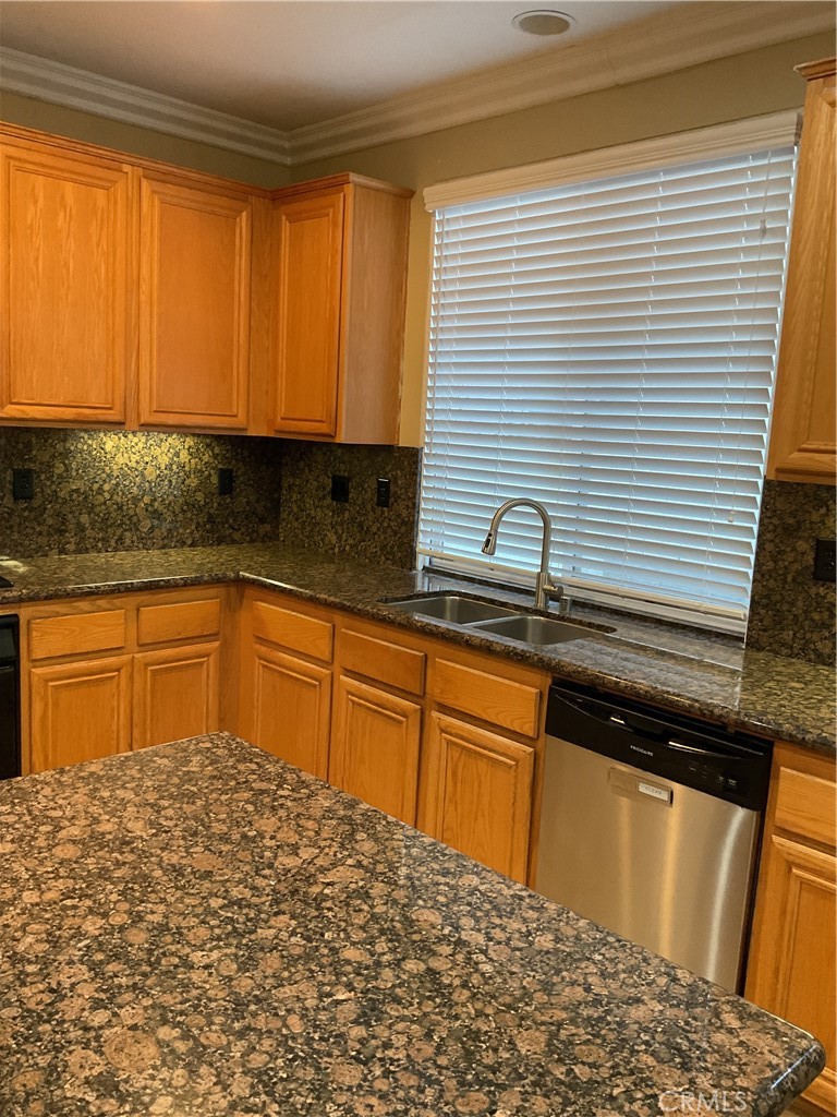 17636 Cypress Circle Carson, CA 90746 - Photo 8 of 29 a kitchen with a sink and cabinets