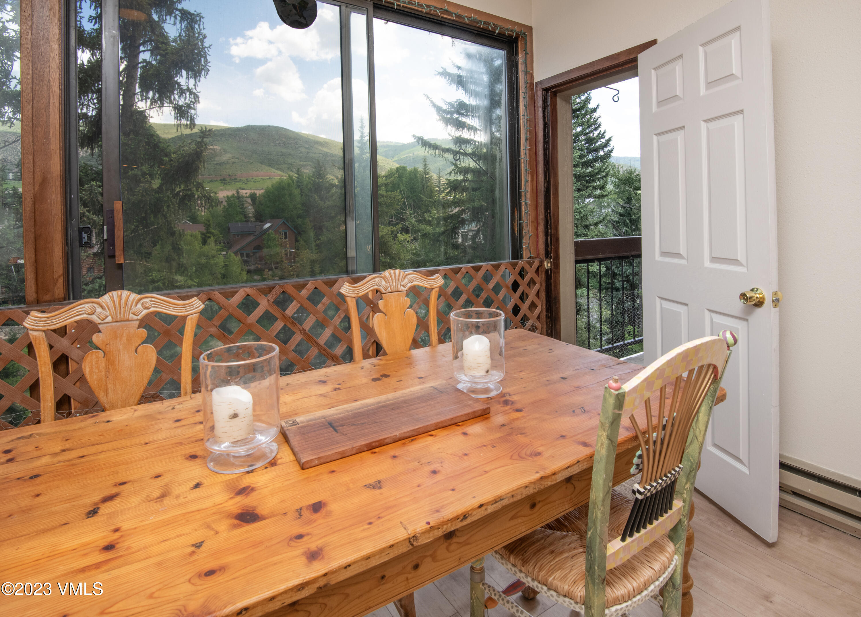 39377 Highway 6, Unit E205 Eagle Vail, CO 81620 - Photo 14 of 40 a view of a dining room with furniture window and outside view