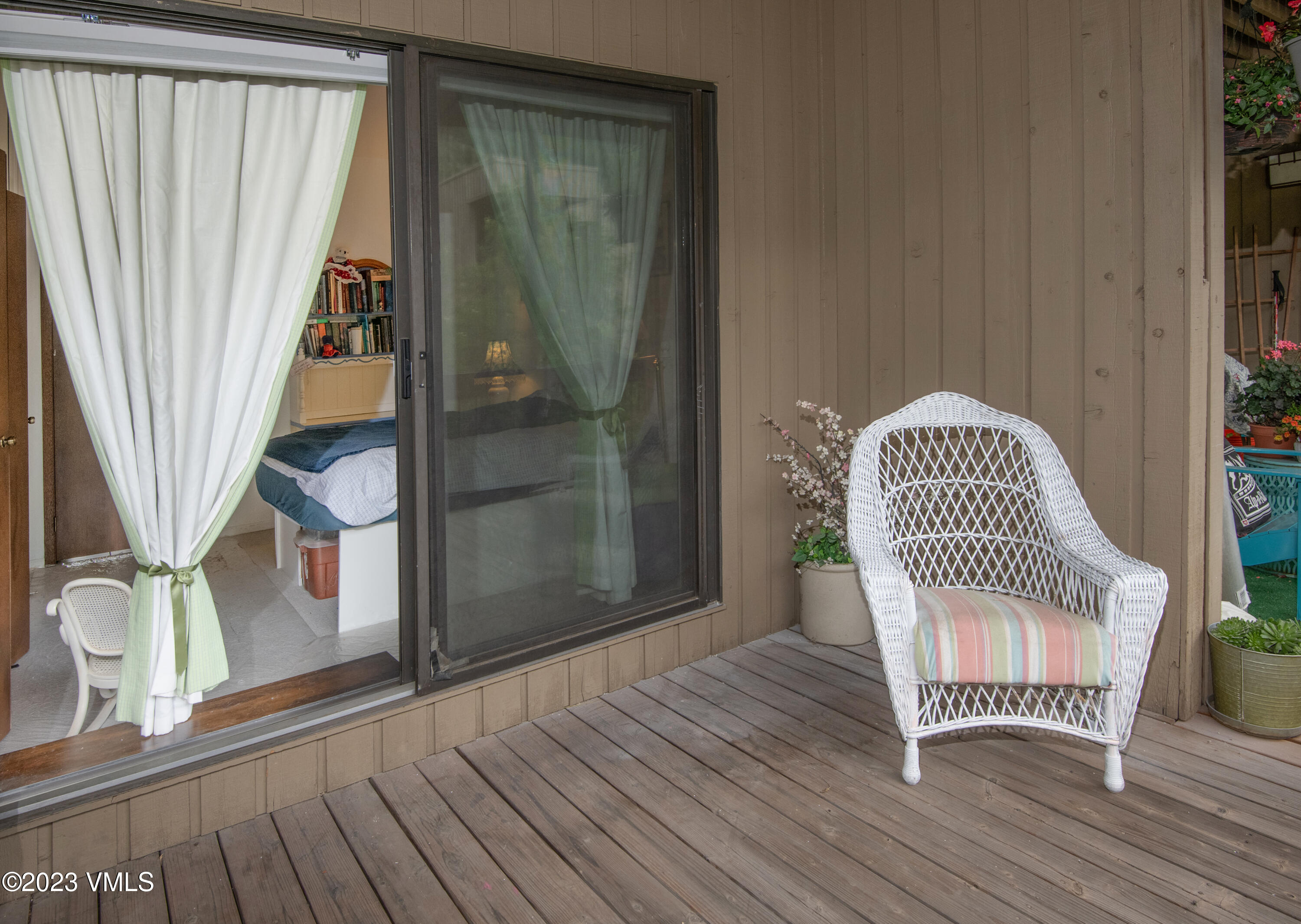 39377 Highway 6, Unit E205 Eagle Vail, CO 81620 - Photo 25 of 40 a view of a hallway with wooden floor and staircase