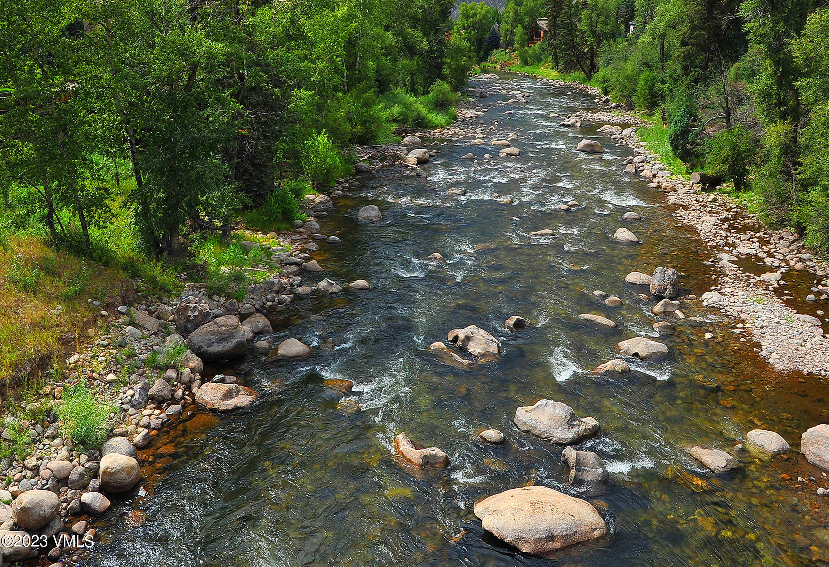 39377 Highway 6, Unit E205 Eagle Vail, CO 81620 - Photo 31 of 40 a view of a backyard of a house