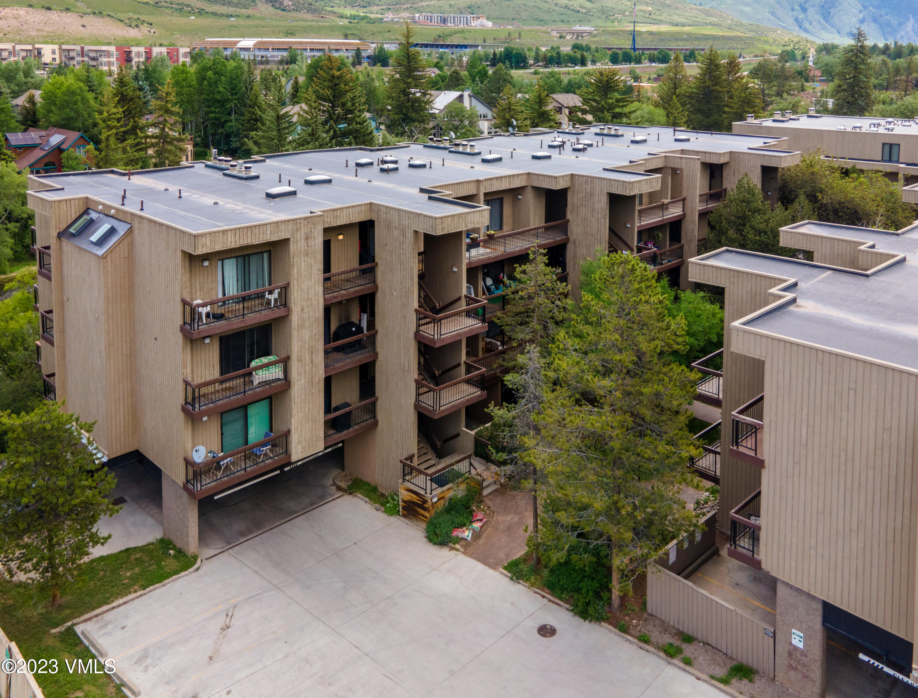 39377 Highway 6, Unit E205 Eagle Vail, CO 81620 - Photo 32 of 40 an aerial view of a house with a yard and potted plants