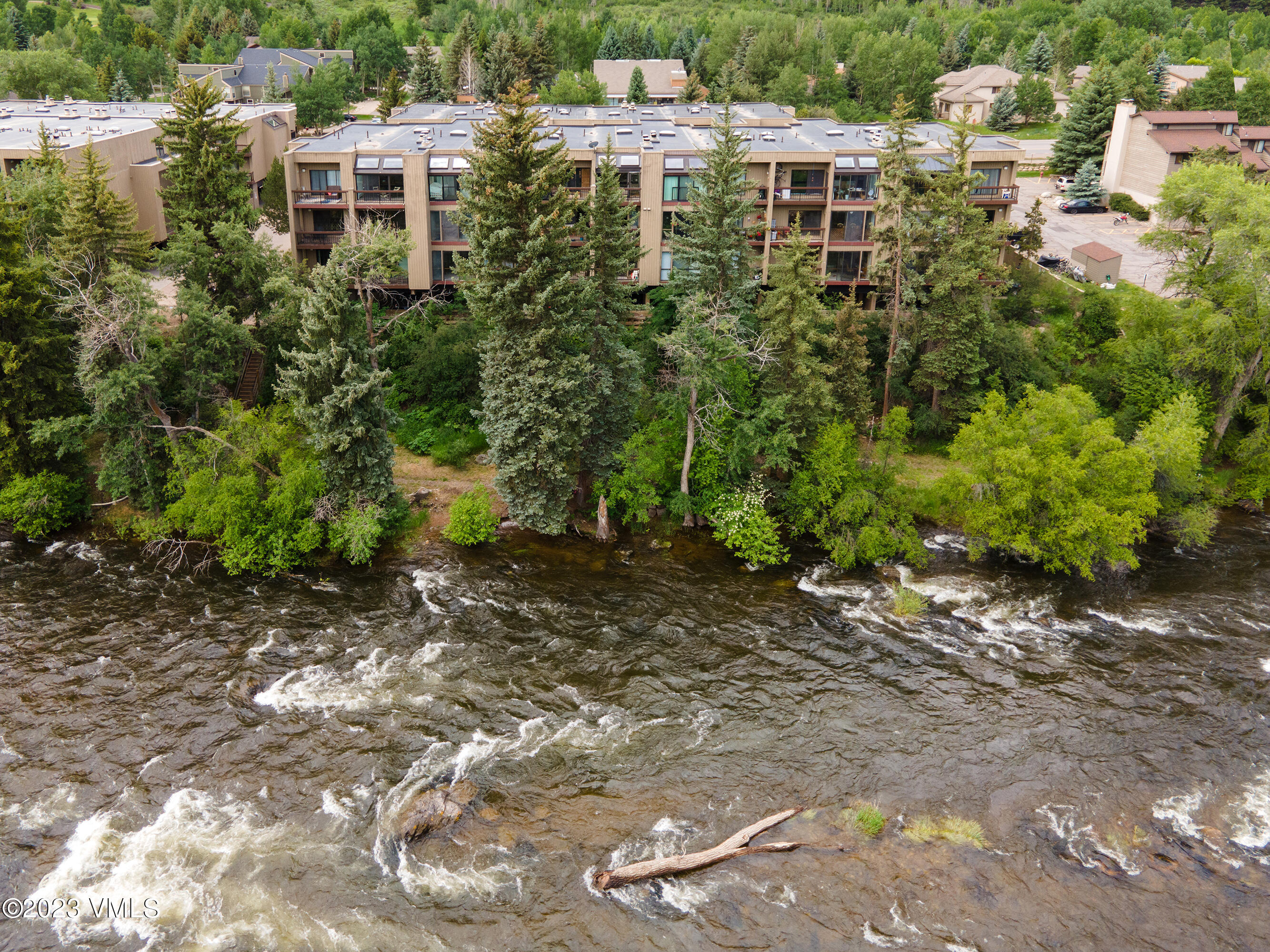 39377 Highway 6, Unit E205 Eagle Vail, CO 81620 - Photo 38 of 40 a view of residential houses with yard and trees