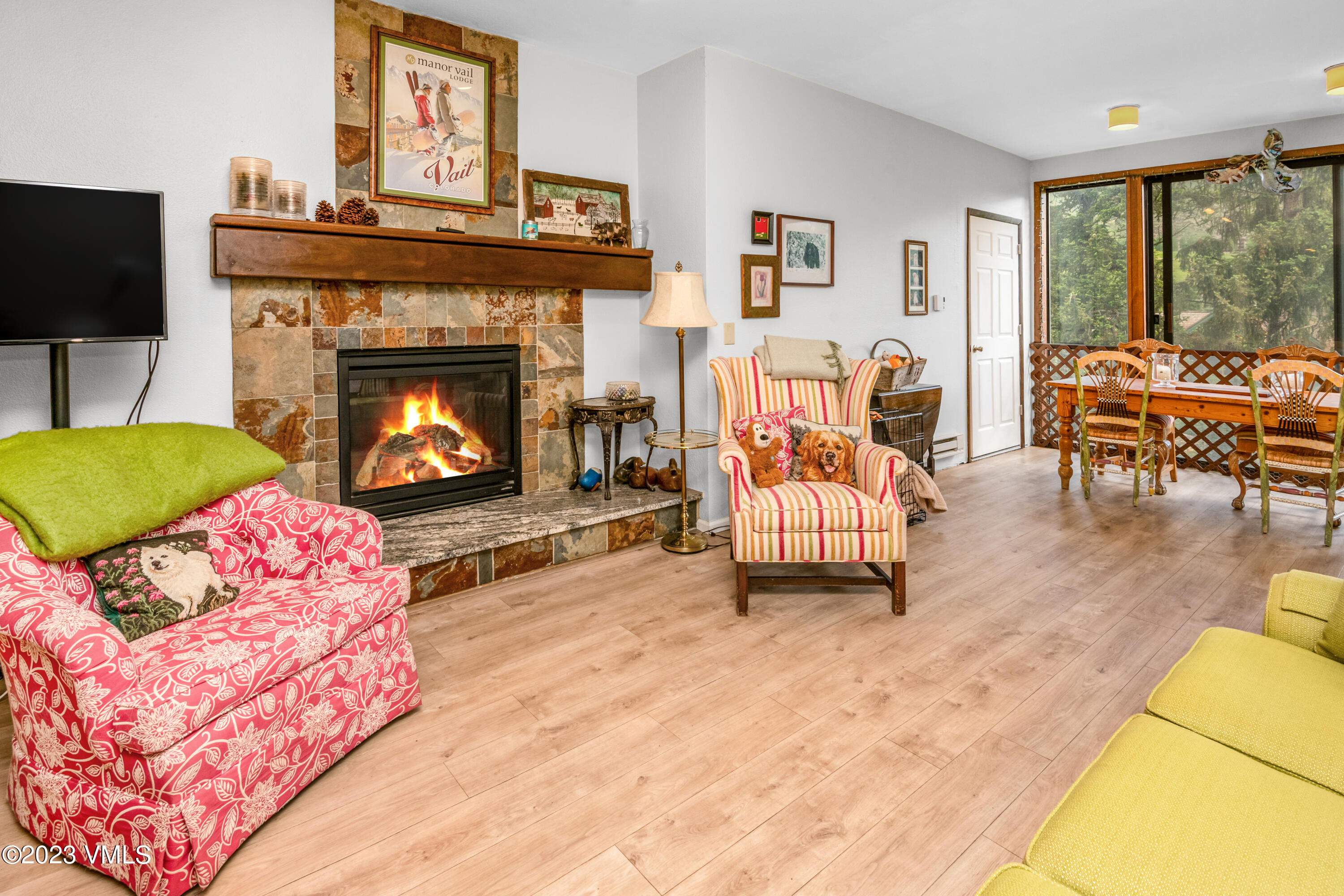 39377 Highway 6, Unit E205 Eagle Vail, CO 81620 - Photo 10 of 40 a living room with furniture and a fireplace