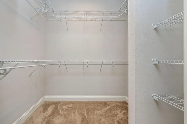 a view of a room with racks on the wall