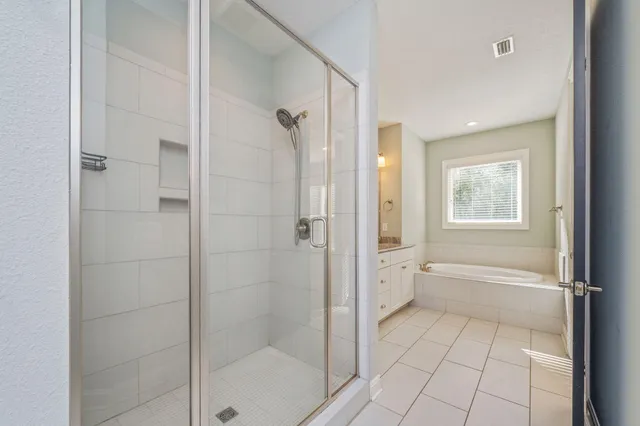 a bathroom with a shower and a toilet