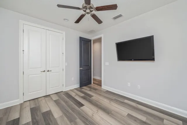 a view of a livingroom with a flat screen tv