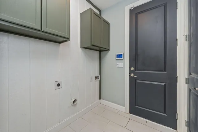 a view of a porch with wooden floor