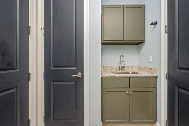 a swimming pool with yard outdoor seating and yard in the back