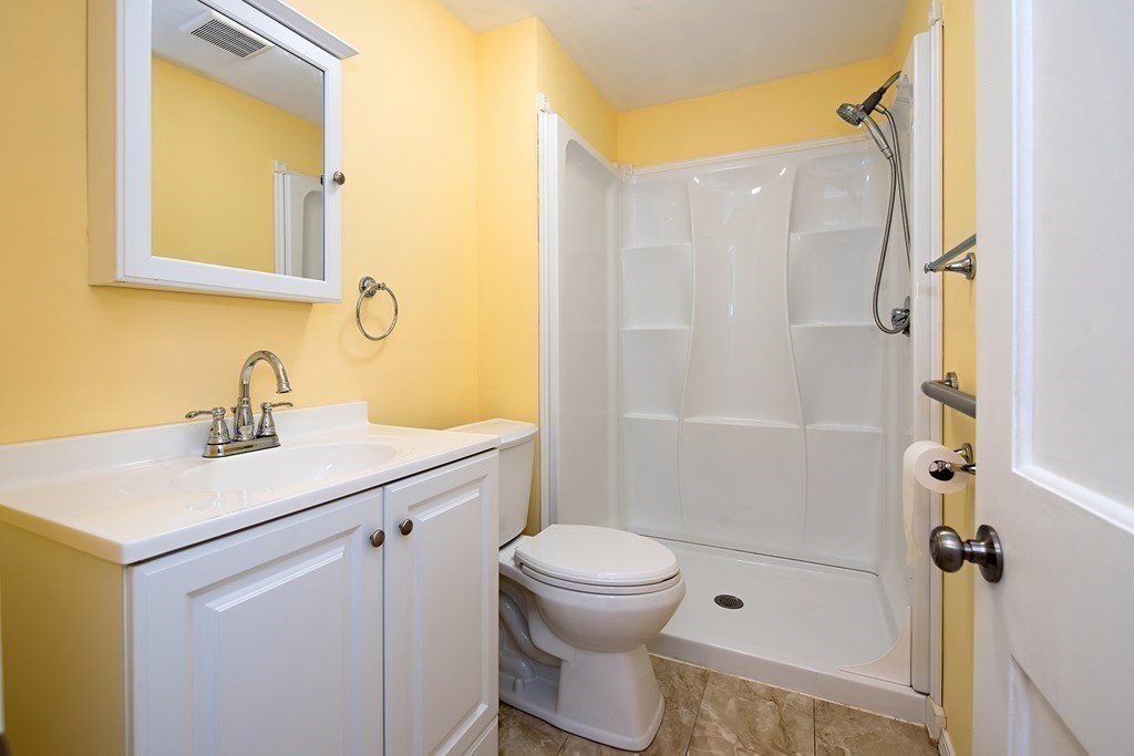 44 Charlotte Road Walpole, MA 02032 - Photo 7 of 25 a bathroom with a sink toilet and shower